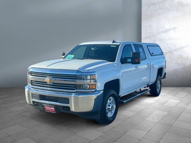 2018 Chevrolet Silverado 2500HD LT in Summit White — front three-quarter view