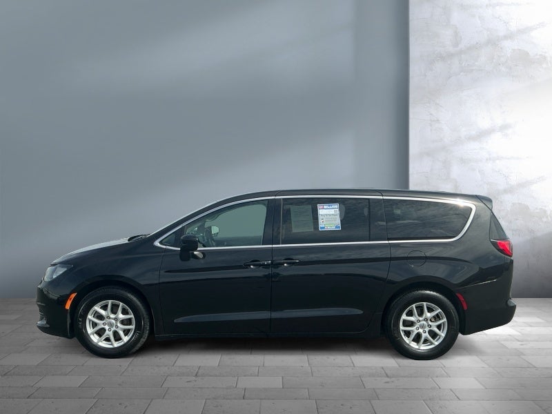 2023 Chrysler Voyager — rear three-quarter view