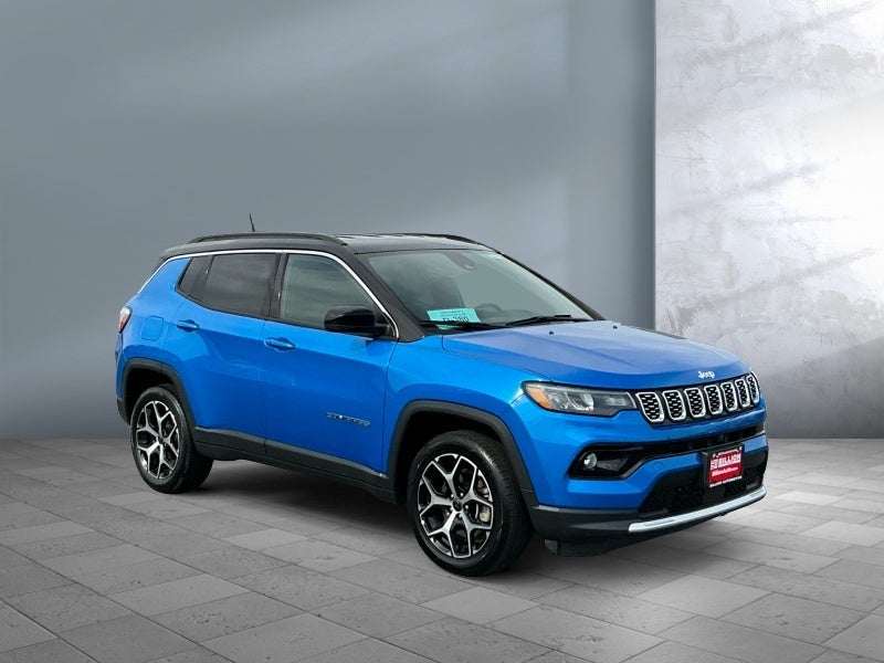 2025 Jeep Compass Limited in Hydro Blue Pearlcoat — front three-quarter view