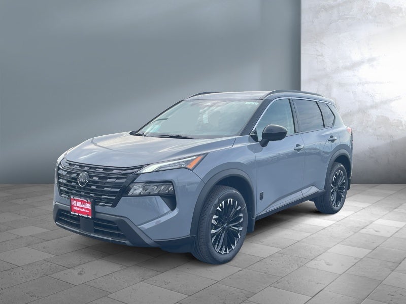 2026 Nissan Rogue Dark Armor in Boulder Gray Pearl — front three-quarter view
