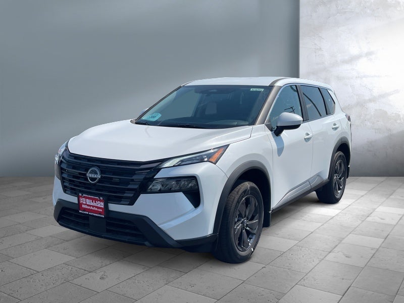 2026 Nissan Rogue SV in Everest White Pearl Tricoat — front three-quarter view