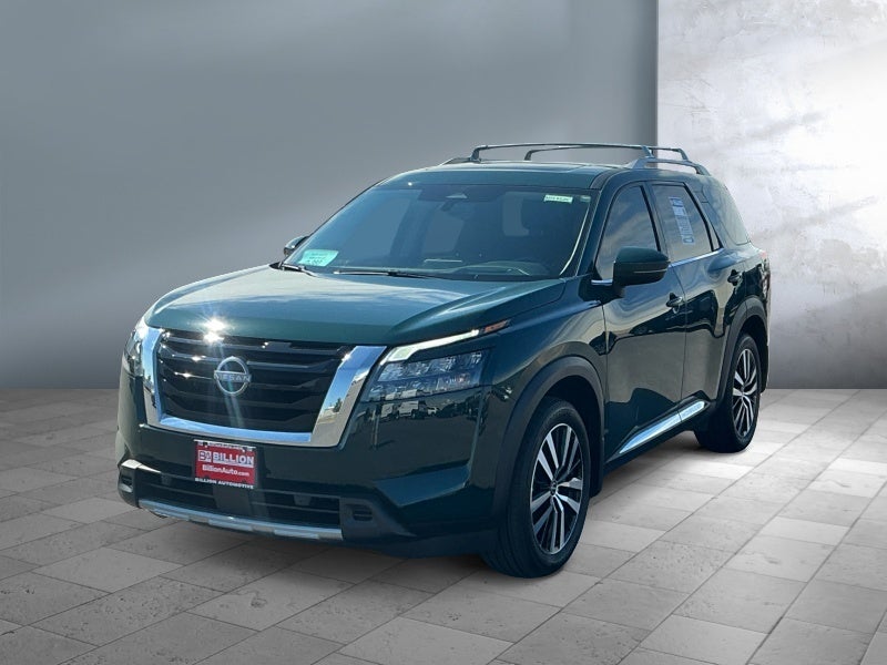 2025 Nissan Pathfinder Platinum in Obsidian Green Pearl — front three-quarter view