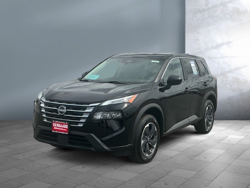 2024 Nissan Rogue SV in Super Black — front three-quarter view