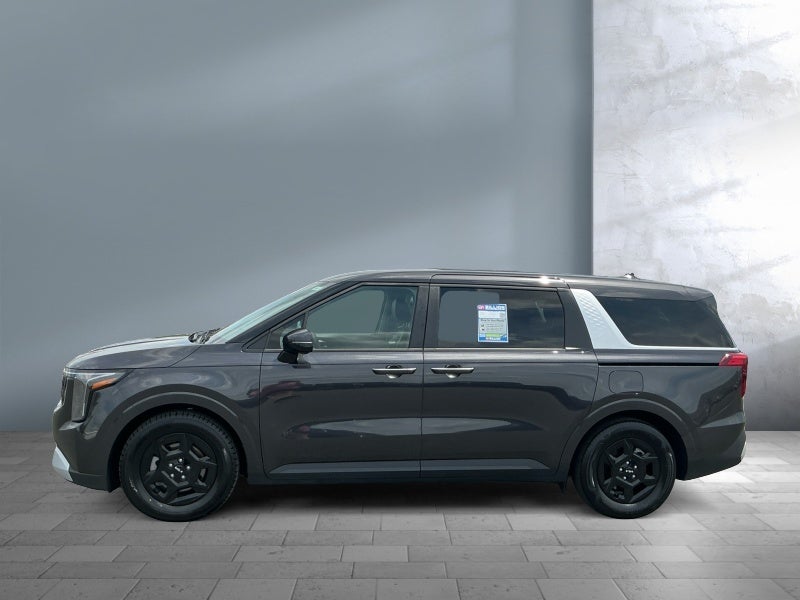 2026 Kia Carnival — rear three-quarter view